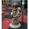 Image 1 : POLYRESIN FIGURINE GLASS TABLE