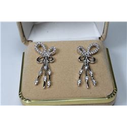 SILVER BOW EARRINGS W/ CZ ACCENTS
