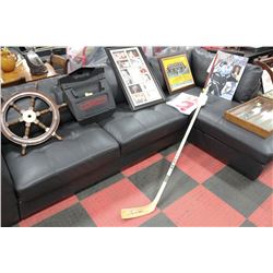 BLACK LEATHERETTE CHAISE LOUNGE SECTIONAL