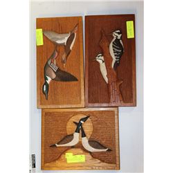 THREE SIGNED WOOD CARVING PICTURES OF WOODPECKERS,