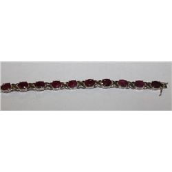 .925 SILVER RUBY OVAL MIXED CUT 6.5" BRACELET