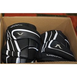 BOX W/ JUNIOR 12 INCH BAUER VAPOR HOCKEY