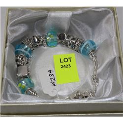 SILVER TONE CHARM STONES BRACELET