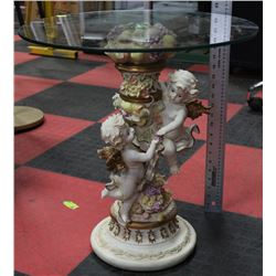 POLYRESIN FIGURINE GLASS TOP COFFEE TABLE