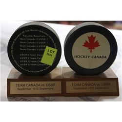PAIR OF TEAM CANADA VS. USSR HOCKEY PUCK