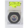 Image 1 : 1980s OILERS GAME USED PUCK IN CASE
