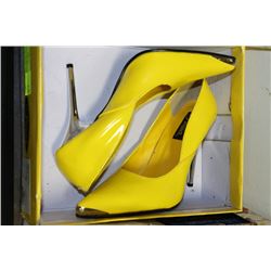 PAIR OF YELLOW "PLEASER" STEEL HIGH HEELED SHOES