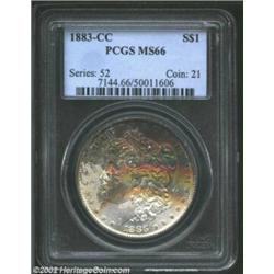 1883-CC S$1 MS66 PCGS. Sharply struck and lustrous with golden reverse toning and mottled gold, gree