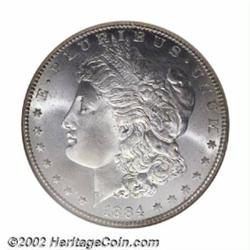 1884-CC S$1 MS67 NGC. The lightest blush of variegated color along the upper right reverse denticles