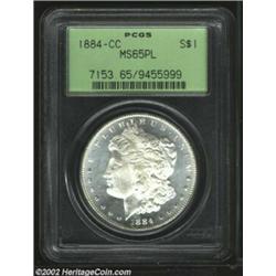 1884-CC S$1 MS65 Prooflike PCGS. Full white brilliance with nicely reflective fields and frosted dev