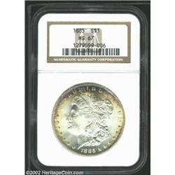 1885 S$1 MS67 NGC. The surfaces are brilliant frosty-white in the centers, but a modicum of iridesce