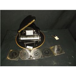 MUSICAL GRAND PIANO W/ METAL DISCS