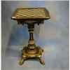 Image 1 : A Victorian papier mache games table, the top inlaid a chess board, fitted a drawer, raised on a...