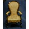 Image 1 : A Victorian carved walnutwood show frame open arm chair upholstered in pink material on cabriole...