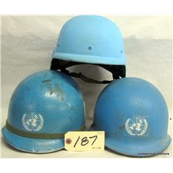 BOX LOT THREE UN HELMETS