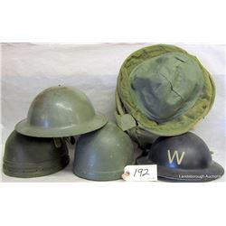 FOUR MILITARY HELMETS