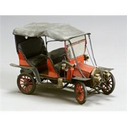 Frontier Red and Black Painted Tinplate Model of a 1918 Buick Four-Seat Touring Sedan, Palm Spr...