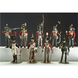 Group of Nine Military Figures, 20th Century, Including two grenadiers, two privates, a troop...