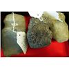 Image 1 : Three grooved stone tools