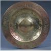 Image 1 : An English brass alms dish, - An English brass alms dish, the central boss chased with a cross w...