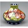 Image 1 : A Moorcroft Hibiscus pattern compressed baluster vase, - A Moorcroft Hibiscus pattern compressed...