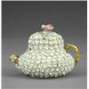 Image 1 : A Rockingham squat pear shaped miniature teapot and cover, - A Rockingham squat pear shaped mini...