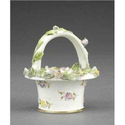 A Rockingham miniature circular basket, - A Rockingham miniature circular basket, with handle, m...