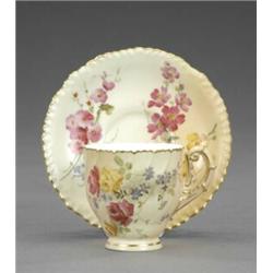 A Royal Worcester blush ivory spirally moulded tea cup and saucer, - A Royal Worcester blush ivo...