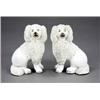 Image 1 : A pair of Staffordshire figures of seated poodles, - A pair of Staffordshire figures of seated p...
