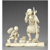 Image 1 : A Japanese ivory carving of a peasant and running boy, - A Japanese ivory carving of a peasant a...
