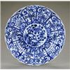 Image 1 : A Chinese shaped circular dish, - A Chinese shaped circular dish, the centre painted with peonie...