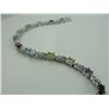 Image 2 : MULTI GEMSTONE AND DIAMOND TENNIS BRACELETWITH 13 OVAL GEMSTONES. INCLUDES $425 CERTIFICATE