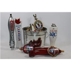 PAIL OF BEER TAPS