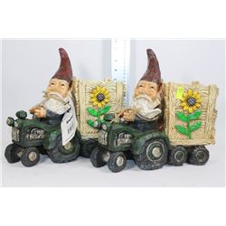 PAIR OF GNOME ON TRACTOR FLOWER POTS
