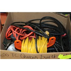 BOX OF ASSORTED POWER CORDS, TROUBLE LIGHT ETC