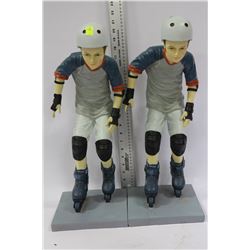 PAIR OF BOY ROLLERBLADE STATUETTE