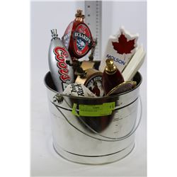 PAIL OF BEER TAPS