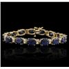 Image 1 : 14KT Yellow Gold 28.50ctw Sapphire and Diamond Bracelet