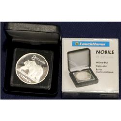 2004 Grizzly bear $8 silver coin from the coin and stamp set. The coin comes in a black display box 