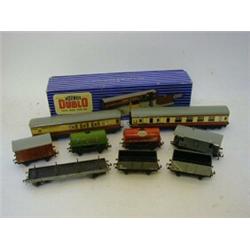 A COLLECTION OF MOSTLY UNBOXED HORNBY  DUBLO ROLLING STOCK, Royal Mail Van set, two coaches, wago...