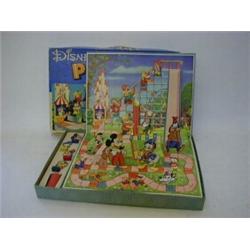 A BOXED DISNEYLAND POP-UP RACE 1950'S, maker Chad Valley, a children's 'Topper' cartoon book, wit...