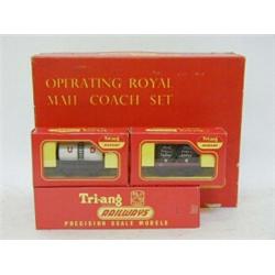 A BOXED TRI-ANG RAILWAYS OPERATING ROYAL MAIL COACH SET, R23, with three boxed wagons (4)  20-30...