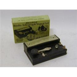 A BOXED MECHANICAL TOY, c.1930's, 'Standard Radio-Telegraph Signal Set', No.150, maker Strauss To...