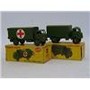 Image 1 : A BOXED DINKY TOYS MILITARY AMBULANCE, No.626, driver, no windows, and a boxed Army Covered Wagon...