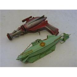 A SUTCLIFFE TINPLATE 'NAUTILUS', 'Copyright Walt Disney Productions', length 24cm and a Lone Star...