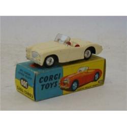 A BOXED CORGI TOYS AUSTIN HEALEY SPORTS CAR, No.300, cream livery, red seats  30-50...
