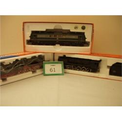 Three Roco railway locomotives…