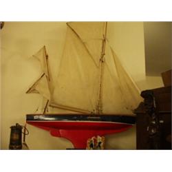 Early 20c pond yacht with canvas sails…