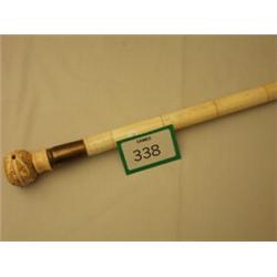 Bone brass tipped walking stick with carved pocket watch top…