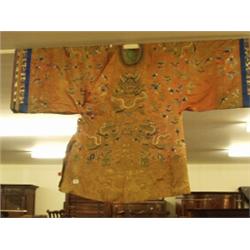 19c informal Chinese dragon silk robe of chestnut brown with dragons chasing flaming pearls amid …